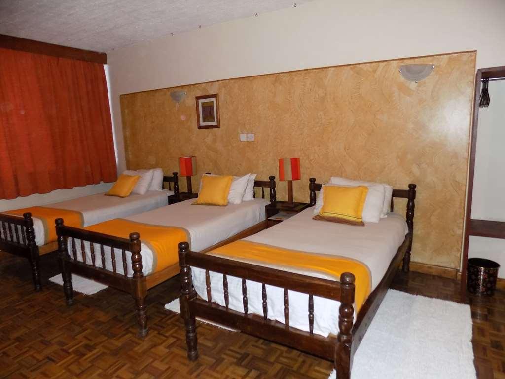 Kenya Comfort Suites Nairobi Oda fotoğraf